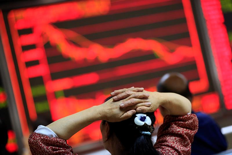 La Bourse de Shanghai s'ouvre en rouge et perd 0,44%